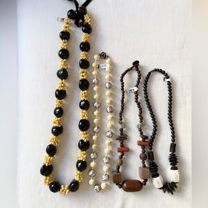 Vintage: 4 pc costume jewelry necklace lot (wood and plastic beaded necklaces)